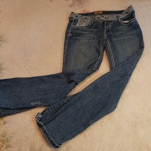 Luxuries boot cut jeans. 33" waist 38" length.